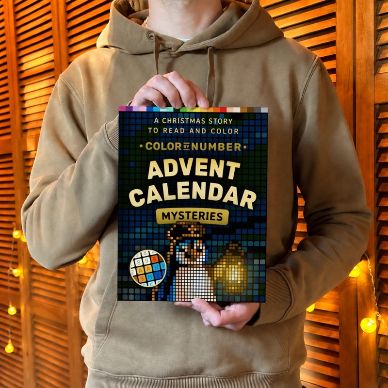 Éloi holding the Color by Number Advent Calendar Mysteries book in front of wooden shutters and fairy lights.